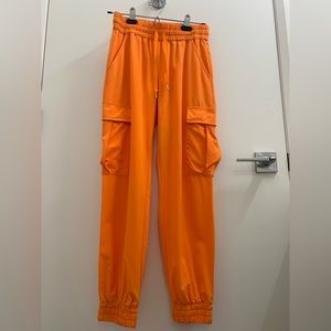ARITZIA TNA Parachute Pants in Orange, XS